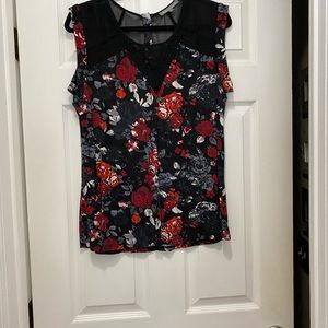 Black sleeveless blouse with lace and red roses